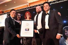 Dr Sanjeev Nayak receiving the Sentinel “Our Heroes” Award from the world's strongest man Eddie Hall.