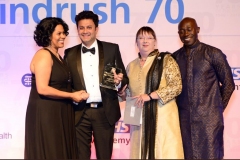 Dr Sanjeev Nayak at 10, Downing Street, London collecting Windrush 70 Award from the British Prime Minister Rt Hon Theresa May for his contribution to the NHS